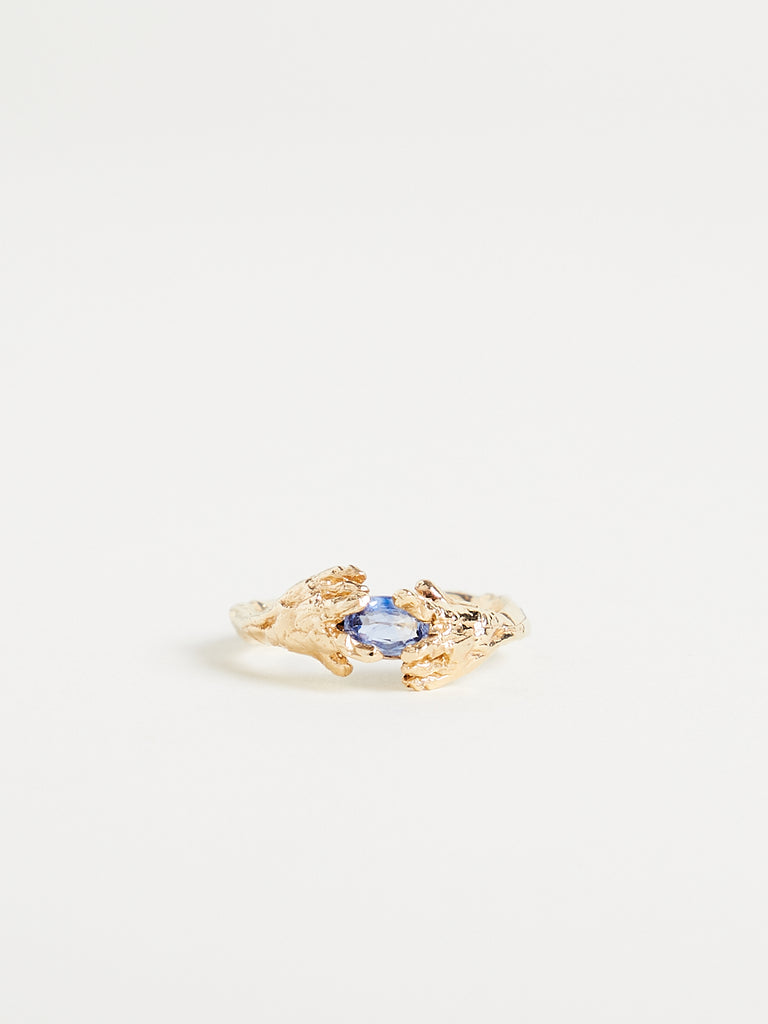 Alice Waese Maia Holding A Stone Ring in 1ct Oval Blue Sapphire